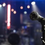 close-up-microphone-concert-stage-with-beautiful-lighting_169016-11074