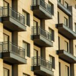 residential-building-with-windows-balconies_140725-7608