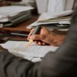 Focus,On,Hand,Of,Experienced,Male,Lawyer,Or,Director,Of